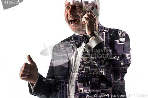 Image of Portrait of bearded businessman smiling. Double exposure city on the background.