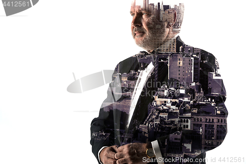 Image of Portrait of bearded businessman. Double exposure city on the background.