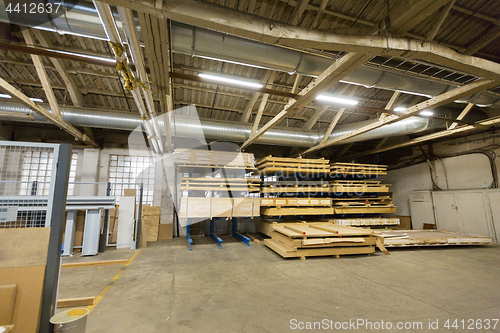 Image of boards storing at woodworking factory warehouse