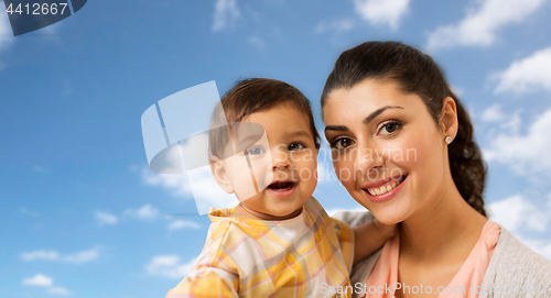 Image of portrait of happy mother with baby daughter