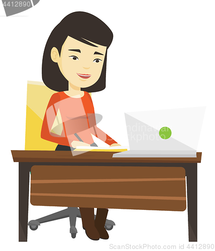Image of Student using laptop for education.