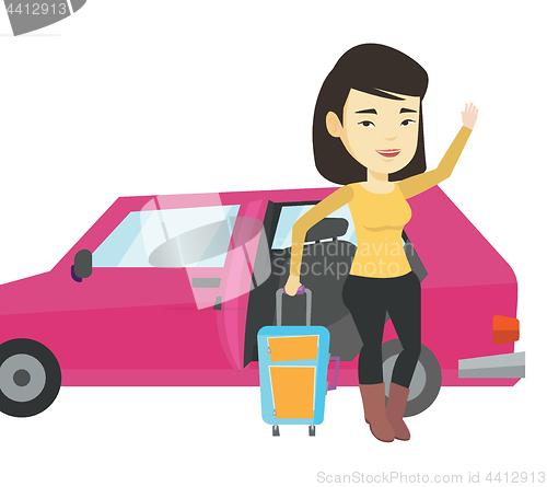 Image of Young asian woman traveling by car.