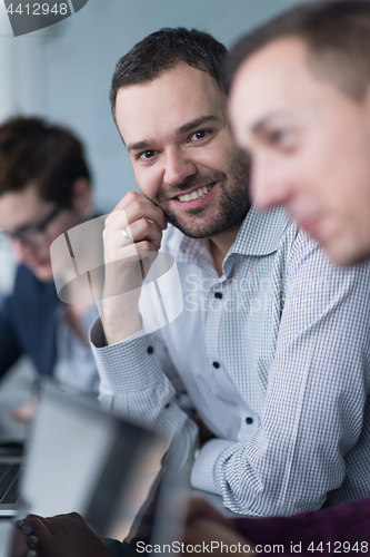 Image of Business Team At A Meeting at modern office building