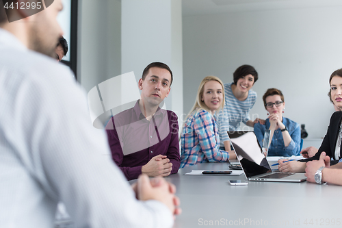 Image of Business Team At A Meeting at modern office building