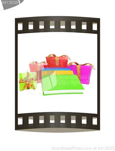 Image of Gifts and books. 3d illustration. The film strip.
