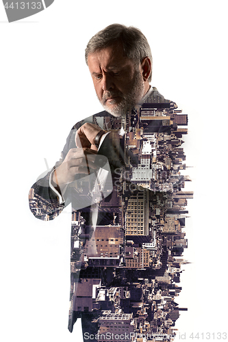 Image of Portrait of bearded businessman. Double exposure city on the background.