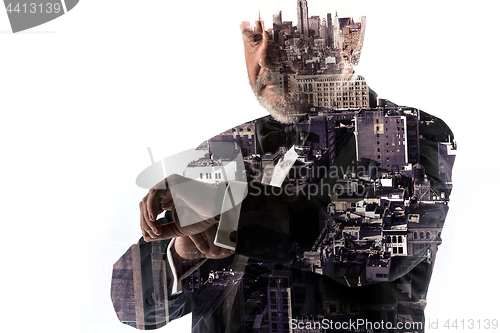 Image of Portrait of bearded businessman. Double exposure city on the background.