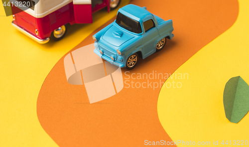 Image of Vintage miniature car and bus in trendy color, travel concept