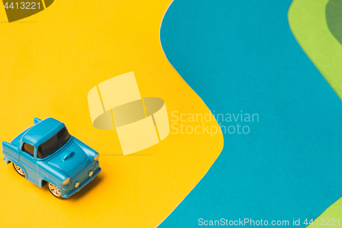 Image of Vintage miniature car and bus in trendy color, travel concept