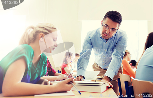 Image of group of students and teacher at school classroom