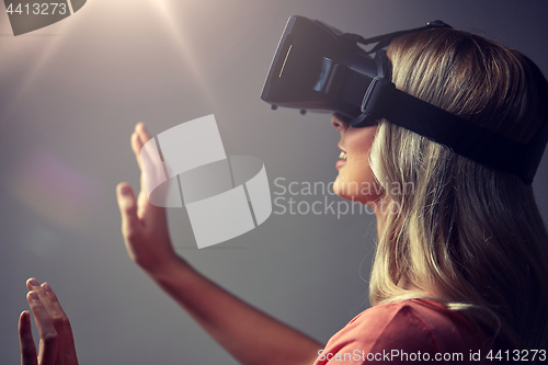 Image of woman in virtual reality headset or 3d glasses