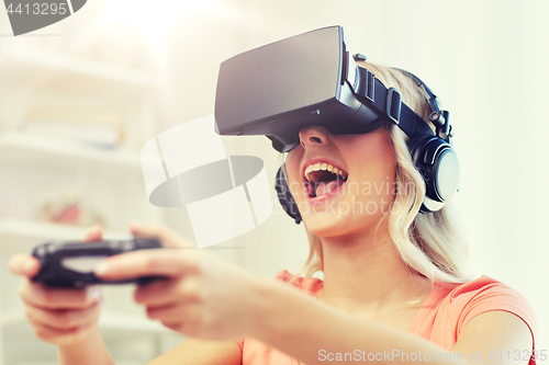 Image of woman in virtual reality headset with controller