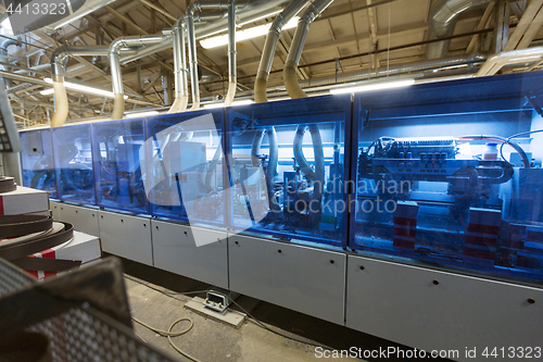 Image of machine at woodworking plant shop