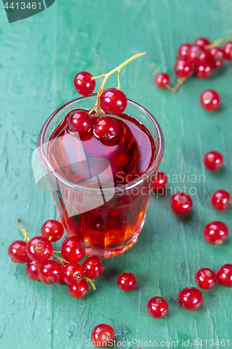 Image of Redcurrant and glass of fruit drink juice