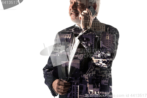 Image of Portrait of bearded businessman smiling. Double exposure city on the background.