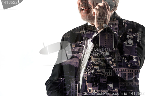Image of Portrait of bearded businessman smiling. Double exposure city on the background.
