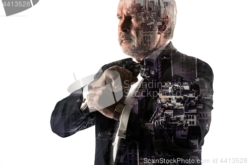 Image of Portrait of bearded businessman. Double exposure city on the background.