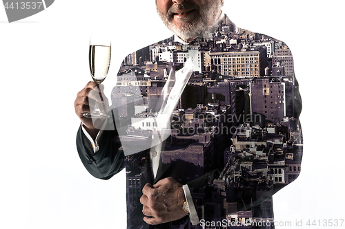 Image of Portrait of bearded businessman. Double exposure city on the background.