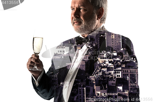 Image of Portrait of bearded businessman. Double exposure city on the background.