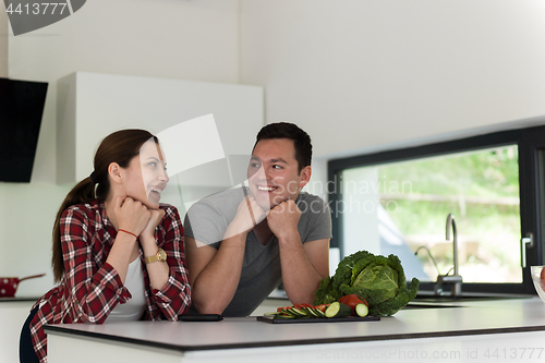 Image of Young couple in the kitchen