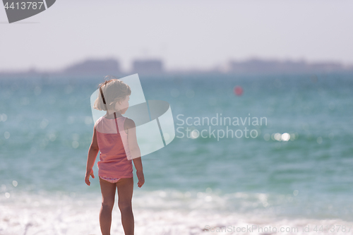 Image of little cute girl at beach