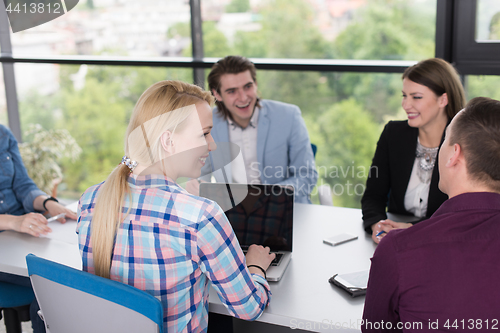 Image of Business Team At A Meeting at modern office building