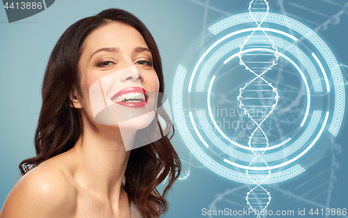 Image of woman with red lipstick over dna molecule