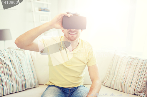 Image of young man in virtual reality headset or 3d glasses