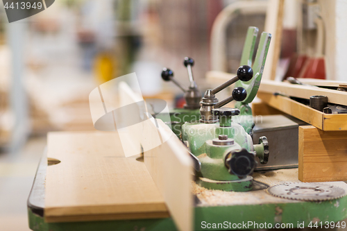 Image of old woodworking machine at workshop