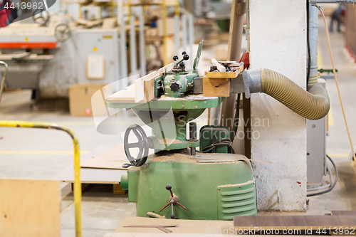 Image of old woodworking machine at workshop