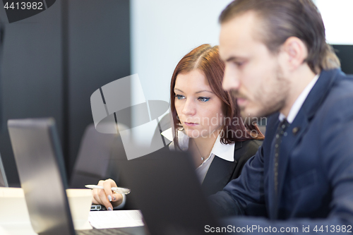 Image of Business people in modern office.