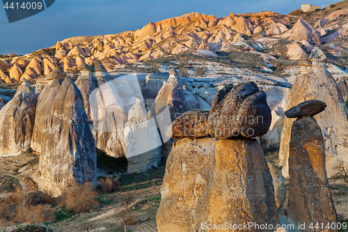 Image of Fairy houses stone cliffs