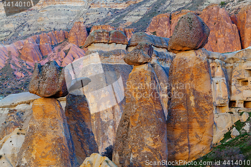 Image of Fairy houses stone cliffs