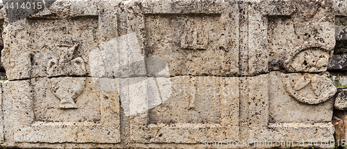 Image of Greek symols on stone plate in ancient city Hierapolis