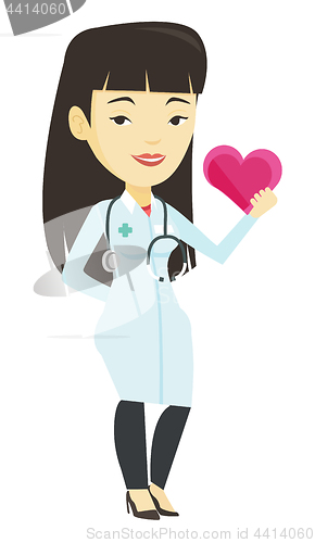 Image of Doctor cardiologist holding heart.