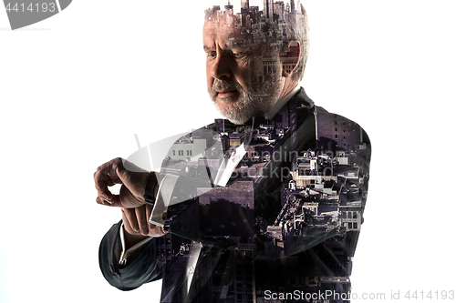 Image of Portrait of bearded businessman. Double exposure city on the background.