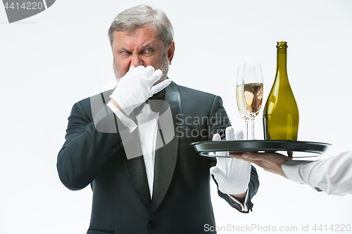 Image of Man complaining for the bad drink