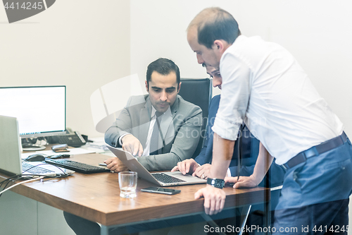 Image of Corporate business team working in modern office.