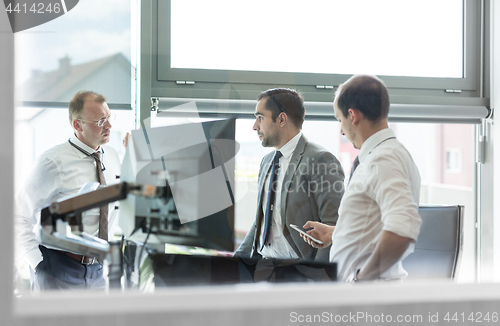 Image of Corporate businessteam working in modern office.