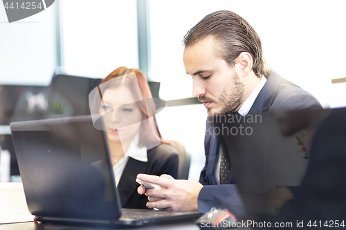 Image of Business people in modern office.