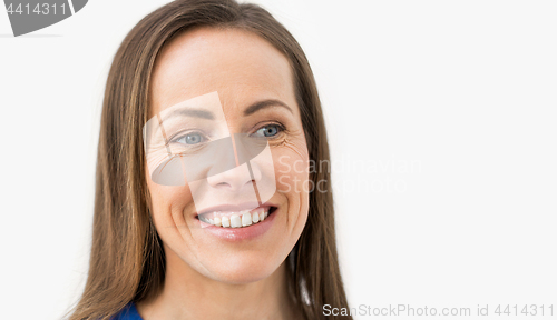 Image of face of happy smiling middle aged woman