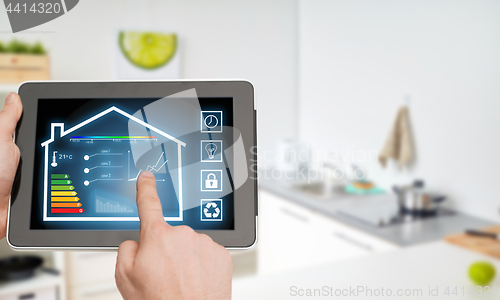 Image of tablet pc with smart home settings on screen