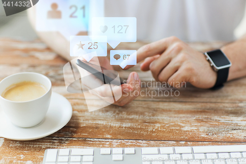 Image of hands with smartphone and smart watch social media