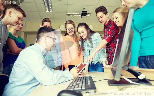 Image of group of students and teacher at school classroom