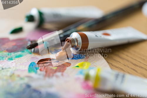 Image of acrylic color or paint tubes and palette