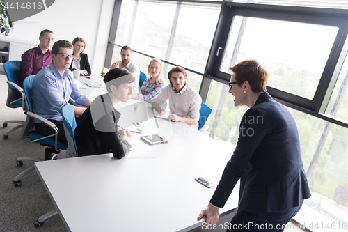 Image of Group of young people meeting in startup office