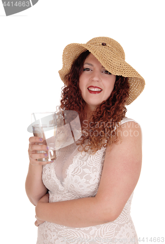 Image of Woman with straw had and glass of water