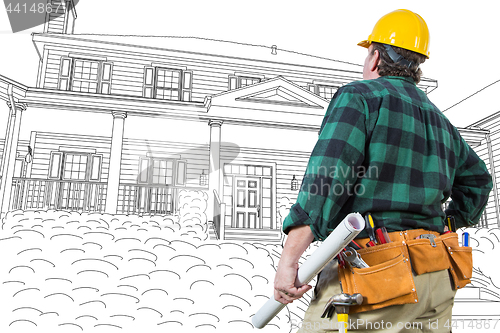 Image of Male Contractor with Hard Hat and Tool Belt Looking At Custom Ho