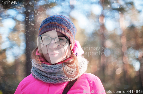 Image of woman portrait in a winter forest