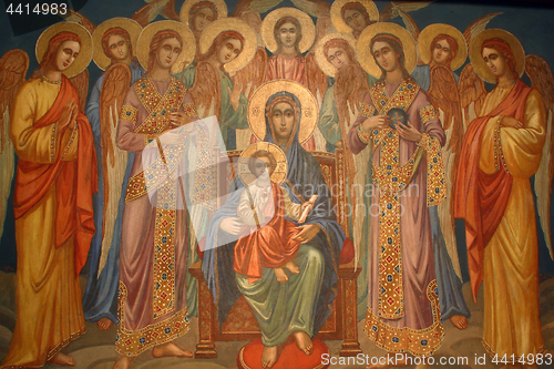 Image of Virgin Mary with baby Jesus and choir of angels